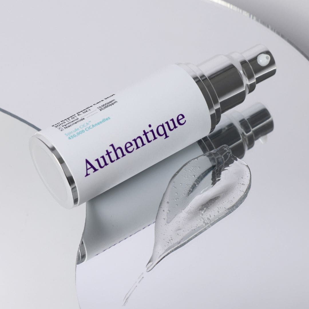 Flacon du sérum Authentique présenté sur fond clair.