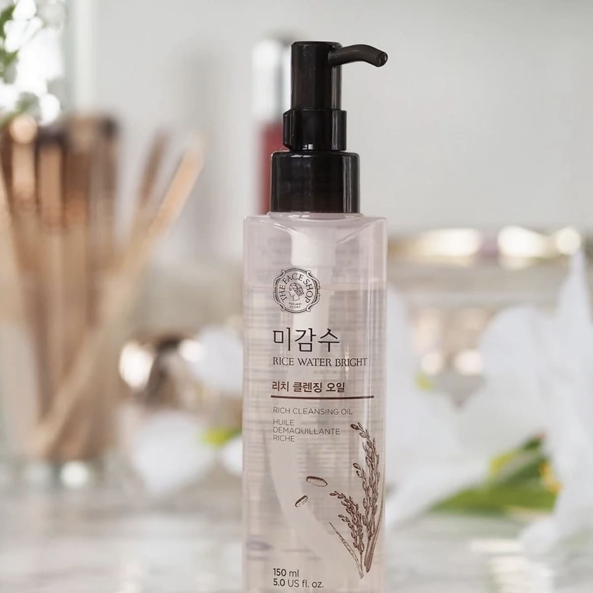 The Face Shop Huile nettoyante éclaircissante à l'eau de riz photo