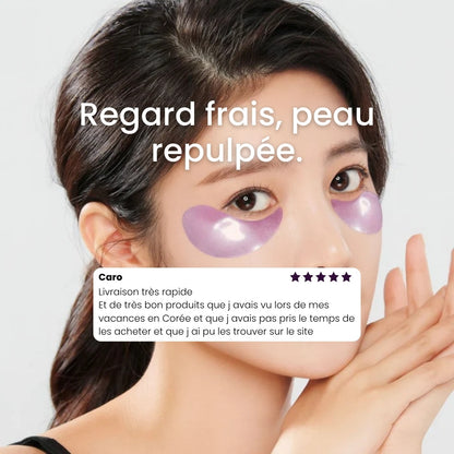 Femme appliquant les patchs Mizon sous les yeux.