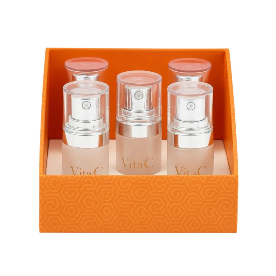 Coffret de sérums de vitamine C pure Cell Happy Co, cure de 5 semaines, dans une boîte orange.