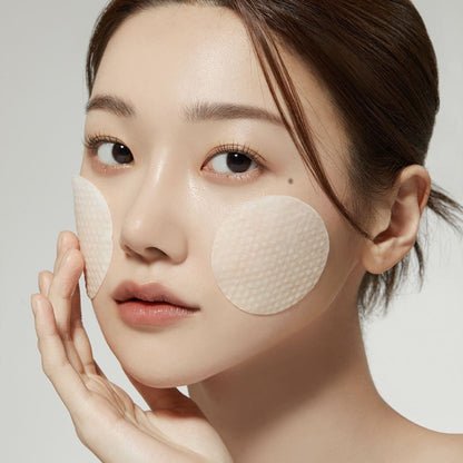 Medicube Pads intenses à la vitamine C avec visage d’une femme